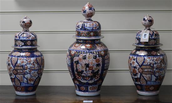 Three Japanese Imari vases and covers, late 19th century